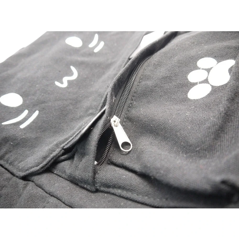 2️⃣ Cute Cat Embroidery Backpack Black Canvas School Bag by Demonchest